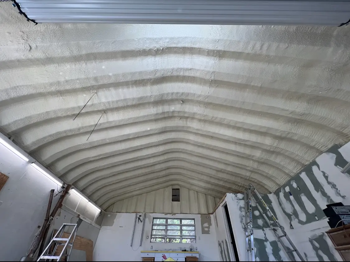 Spray polyurethane foam applied to the underside of a metal roof deck in Patchogue